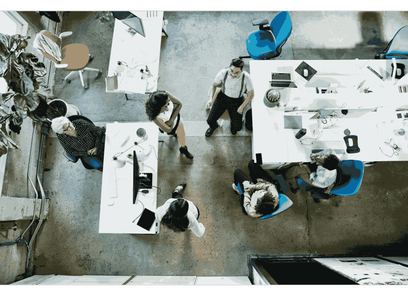 coworkers in an office as seen from above